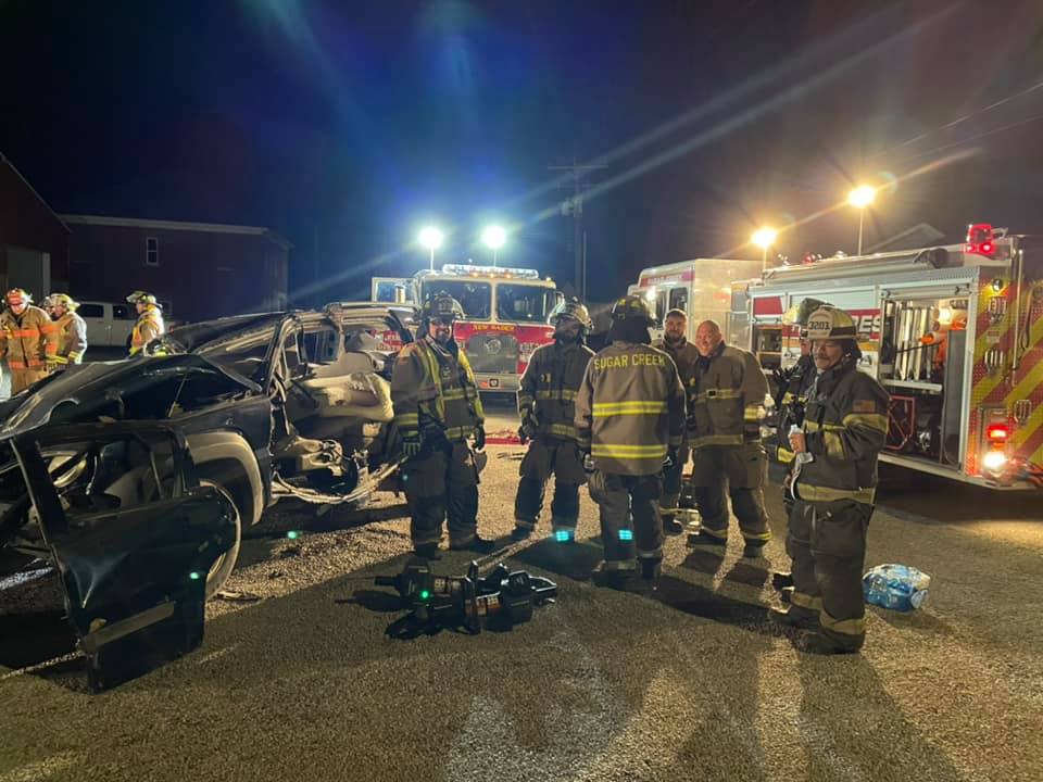Crews working a vehicle extrication scenario